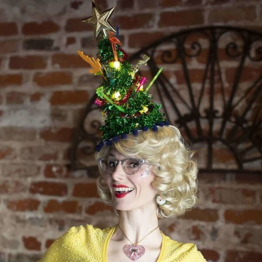 The Girl With The Christmas Tree On Her Head